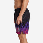 Opposite side view of custom purple basketball shorts showing full flame pattern wrapping the lower leg panel