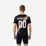 Close-up of full-dye sublimation rainbow stripe detail on custom black soccer training jersey