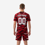 Custom black and red tiger camo soccer uniform full kit back view showing player name and back number placement