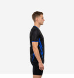 Custom black soccer training jersey with Royal Blue sublimated side panels, left side view showing full panel length from underarm to hem