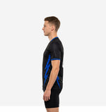 Custom black and Royal Blue soccer training jersey, right side view showing lightning-bolt panel graphic and sleeve cuff trim detail
