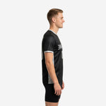 Mens soccer practice jersey in black with silver contrast side panels shown from left side angle