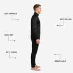 Custom black soccer tracksuit tapered pants detail showing elastic waistband, athletic cut, ribbed ankle cuffs, and silver player number on thigh panel