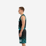 Opposite side view of custom black and teal men's basketball uniform sets showing armhole binding and geometric teal pattern on shorts