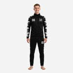 Custom black and white soccer tracksuit full set front view with brushstroke sleeve panels and team logo placement