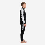 Custom black and white soccer tracksuit side view showing white brushstroke sleeve and pant stripe detail