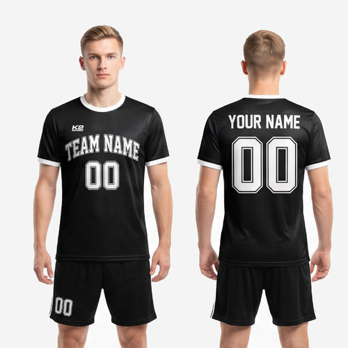 Full custom black and white soccer kit set showing jersey and matching shorts with white side stripe for club and school teams