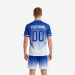 Back view of custom blue and white soccer uniforms showing back player number print zone and gradient design