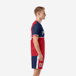 Custom blue and white soccer uniforms Navy Blue and Red colorblock side view showing left-panel Red jersey and shorts split