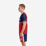 Custom blue and white soccer uniforms Navy Blue and Red colorblock side view showing right-panel Navy jersey and white shorts stripe