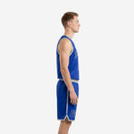 Front view of custom blue basketball uniforms on male model wearing royal blue V-neck jersey with white arced team name and number 00 with matching shorts