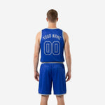 Opposite side view of custom blue basketball uniforms displaying the clean royal blue panels and silver-grey armhole binding and shorts hem detail