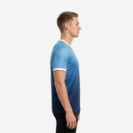 Custom blue and navy gradient soccer training jersey side view showing short sleeve and white cuff trim on male model