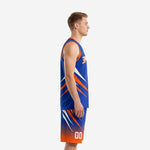 Adult male wearing custom blue and orange basketball uniform set, V-neck jersey with orange slash graphic and matching shorts with fade hem, front view