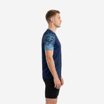 Custom blue soccer training jersey side view showing Sky Blue hex-pattern sleeve fading into Navy Blue body, athletic cut, short sleeve