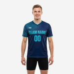 Custom blue soccer training jersey in navy and teal with geometric grid pattern, front view on male model