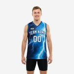 Custom blue and white basketball jerseys with full-panel white lightning graphic and arced team name on adult male model - front view