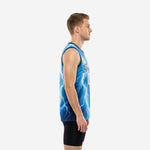 Side view of royal blue sublimated basketball jersey showing lightning bolt pattern wrapping around the torso and navy armhole binding
