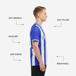 Close detail of V-neckline on custom Royal Blue and white striped soccer jersey with sublimated white contrast trim
