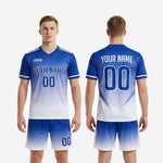 Detail view of custom blue and white soccer kit shorts with gradient fade elastic waistband and leg number print