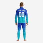 Custom blue and white soccer tracksuit 2-piece set showing matching jacket and pants in sublimated gradient print