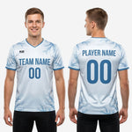 Blue and white soccer training jersey short sleeve cuff showing Steel Blue contrast trim band on 100 percent polyester knit