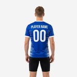Detail view of custom blue and white soccer training jersey showing full-coverage horizontal speed-stripe sublimation pattern in Royal Blue and white