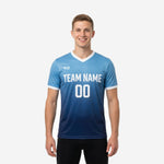 Custom blue and white training jersey with sky blue to navy gradient and white V-neck trim, front view on male model