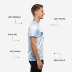 Custom blue and white training jersey V-neck collar detail with Steel Blue contrast binding and K2 Sportswear badge
