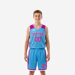 Custom blue and white youth basketball uniforms with purple side panels and white V-neck binding, front view showing team name and number 00