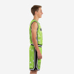 Lime green custom boys basketball uniform full set front view showing team name across chest and front number 11 with geometric triangle sublimation pattern
