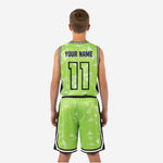 Opposite side view of lime green youth basketball uniform set showing black side panels on jersey and shorts with white trim at hem and waistband