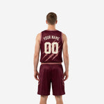 Back view of custom burgundy basketball uniform showing back name and number in cream-white block font on deep maroon fully sublimated jersey