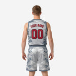 Back view of custom grey digital camo basketball uniform with player name and back number sublimated in red on white panel