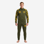 Custom camo soccer tracksuit front view showing Athletic Gold team logo, chest number, and woodland camo sublimated sleeves on Army Green jacket