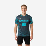 Front view of custom camo soccer training jersey in charcoal and teal with team name and number printed across chest