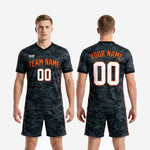 Custom charcoal camo men's soccer uniform set: jersey and matching shorts with orange accents