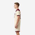 Custom cream and maroon men soccer kit right side view showing athletic cut and contrast maroon collar and cuff details
