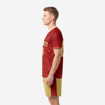 Custom red and gold soccer uniform set men's right side view showing back number and crimson side stripe on gold shorts