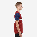 Custom red soccer jersey crew neck detail with white and navy ribbed trim and contrast navy sleeve from shoulder to cuff