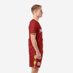 Custom crimson soccer uniforms custom design showing argyle side panel detail, left side view on adult male model
