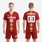 Custom crimson and athletic gold 2-piece soccer uniform set full kit view showing jersey and matching shorts with sublimated argyle design