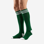 Dark green soccer socks angled view showing Forest Green body and white stripe cuff band