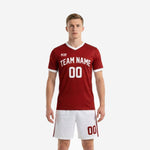 Front view of custom dark red soccer jersey with white team name arc and chest number for men