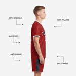 Custom red soccer shorts with charcoal side panel stripe matching the jersey center stripe