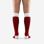 Close detail of white ribbed contrast cuff band on custom dark red soccer socks for club and school teams
