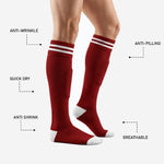 Red and white soccer socks toe and heel detail showing reinforced white footbed construction