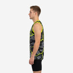 Left side view of gray and neon yellow digital camo basketball jersey showing V-neck binding, armhole binding, and straight hem with side vent