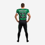 Opposite side view of kelly green and black football uniform set showing sleeve number placement and matching black pant with green leg panel and white edge trim