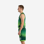 Opposite side view of custom forest green basketball uniform set showing armhole binding and mid-thigh shorts length